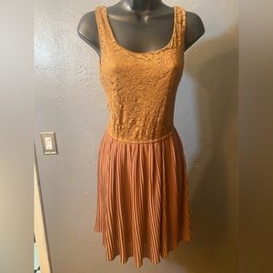 XX1 lace bodices dress with pleated skirt.